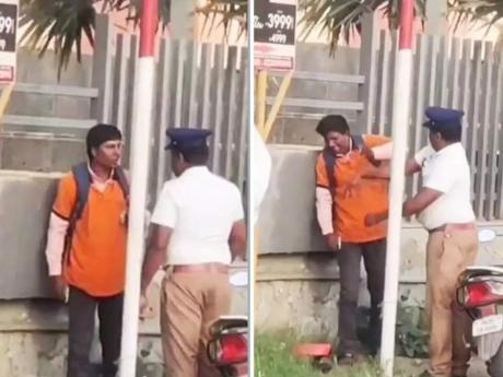 traffic cop showers slaps on food delivey guy